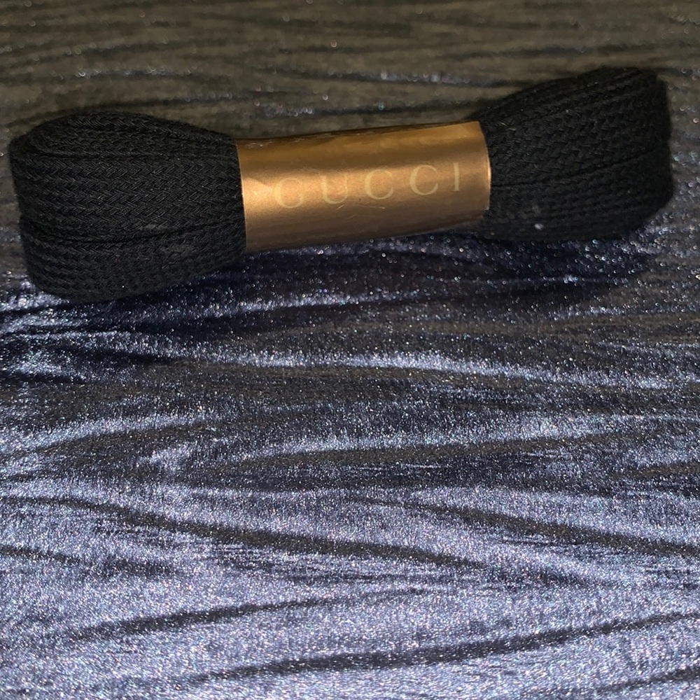 Authentic GUCCI lace strings in the color black. Still wrapped in original pack.